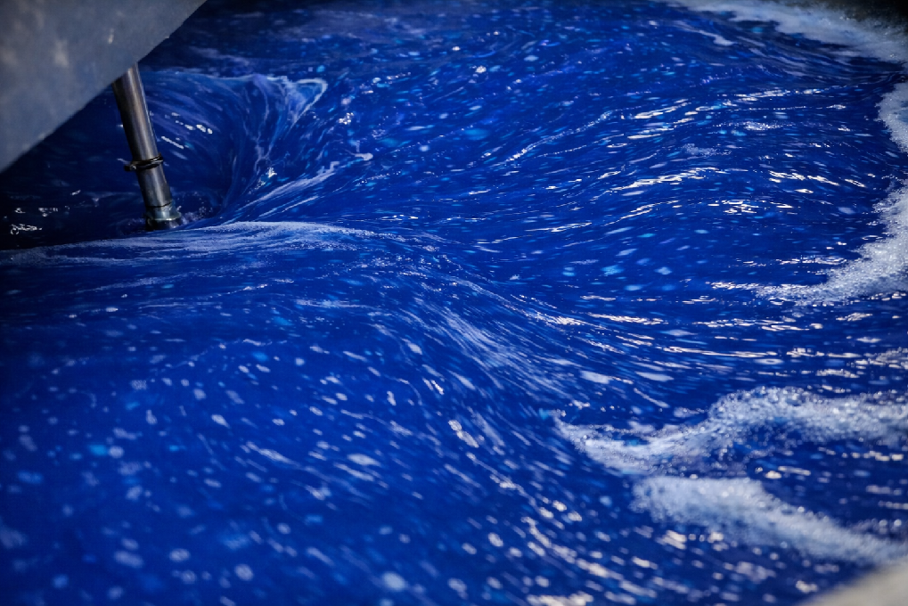 Industrial mixing reactor blending liquid gel at our household chemicals manufacturing facility
