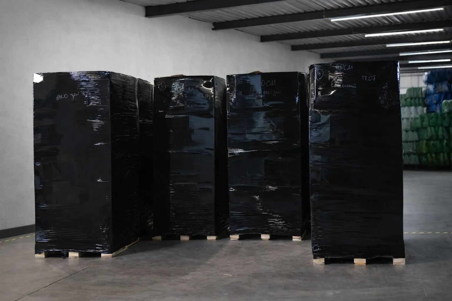 Stretch-wrapped pallets ready for dispatch from our household chemicals manufacturing facility